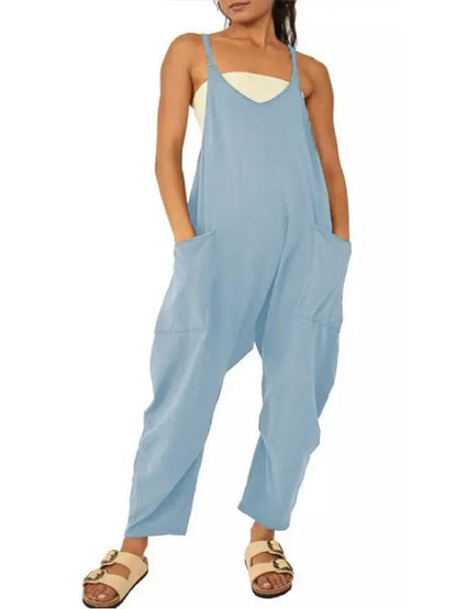 Blue V-neck suspender pocket jumpsuit, front view