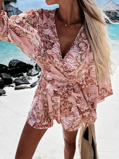 Tropical floral V-neck jumpsuit by the beach