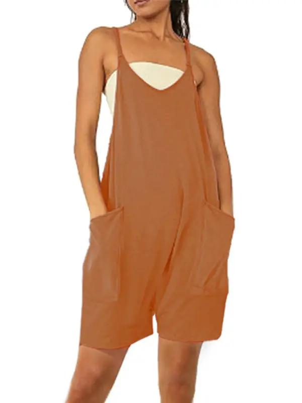 Front view of brown zipper pocket suspenders jumpsuit overalls