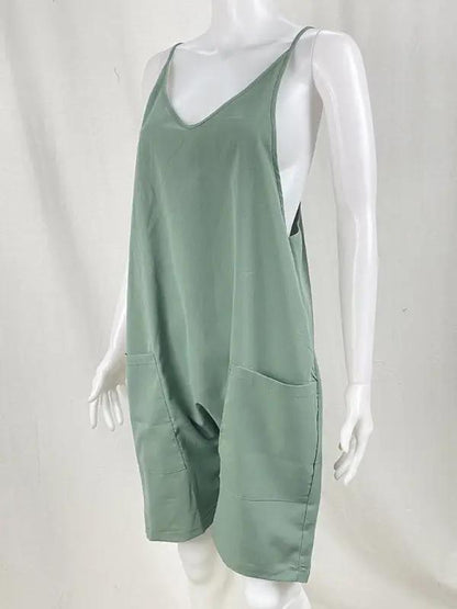 Green zipper pocket suspenders jumpsuit overalls on mannequin