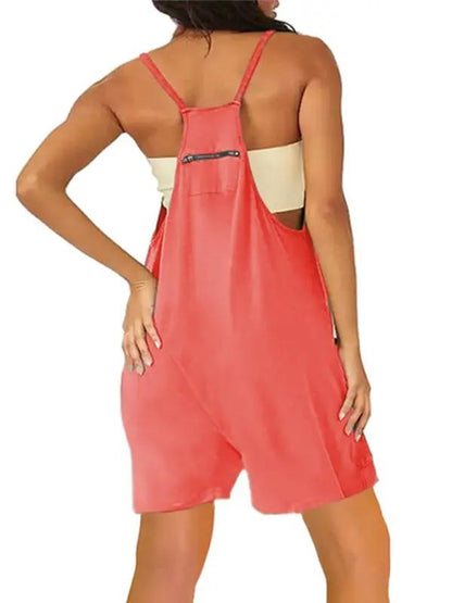 Back view of red zipper pocket suspenders jumpsuit overalls