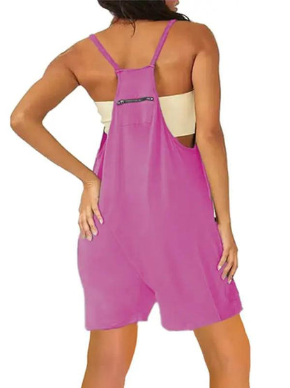 Back view of pink zipper pocket suspenders jumpsuit overalls