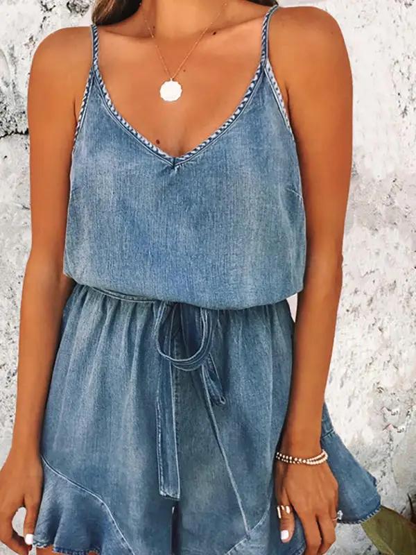 Close-up of denim suspender jumpsuit with tie waist