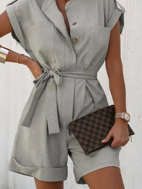 Close-up of gray linen cotton jumpsuit with buttons