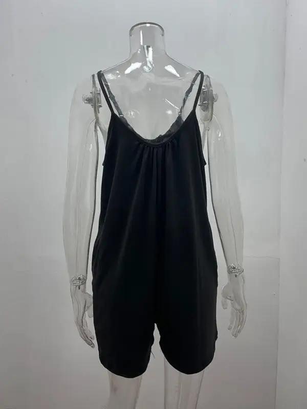 Black loose pocket jumpsuit on mannequin, back view