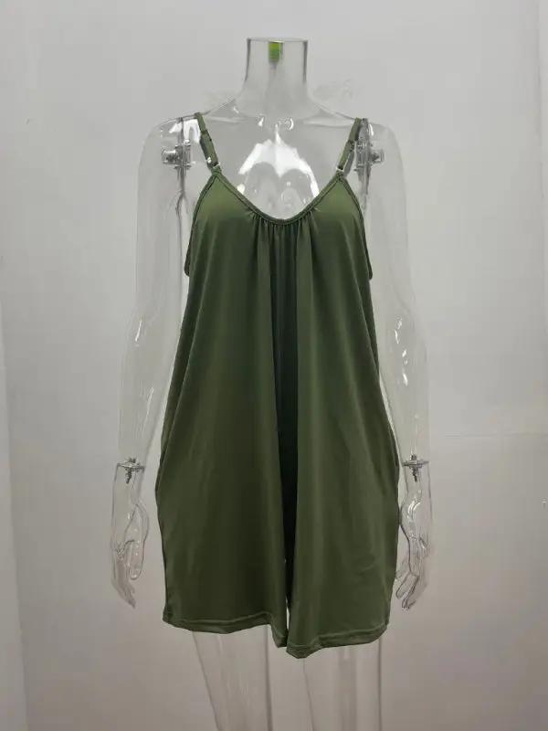Green loose pocket jumpsuit on mannequin, front view