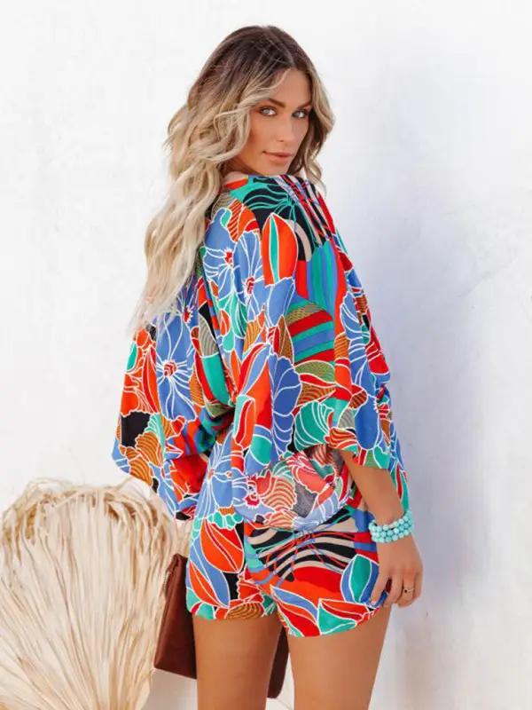 Back view of floral printed short sleeve jumpsuit