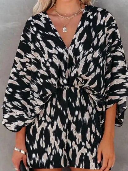 Black and white printed waist short sleeve jumpsuit