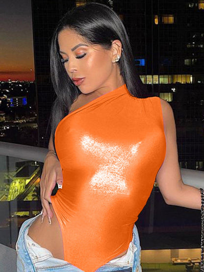Orange one-shoulder sleeveless jumpsuit at night