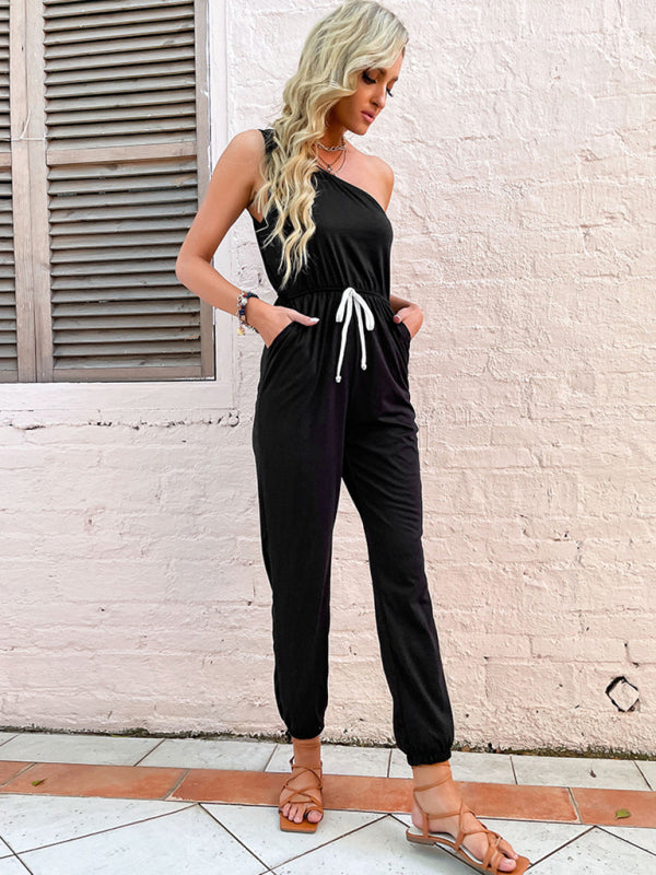 Black one-shoulder jumpsuit with white drawstring