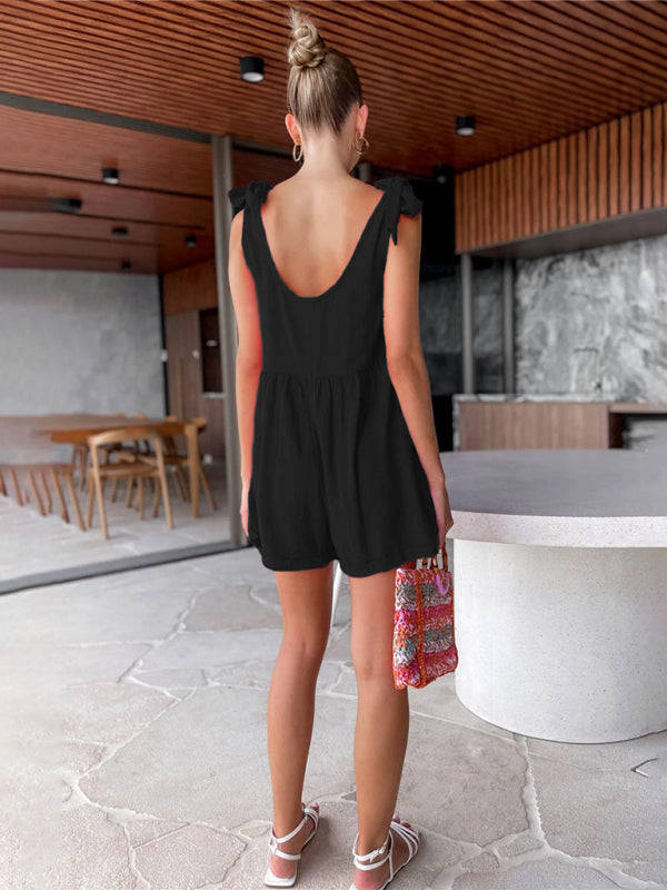 Back view of black sleeveless bow knot jumpsuit