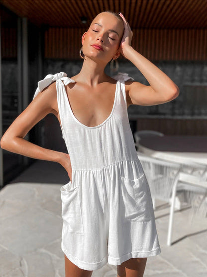 White sleeveless bow knot pocket casual jumpsuit