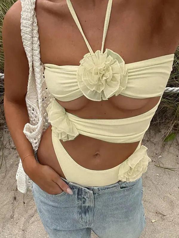 Backless halter neck jumpsuit with floral design