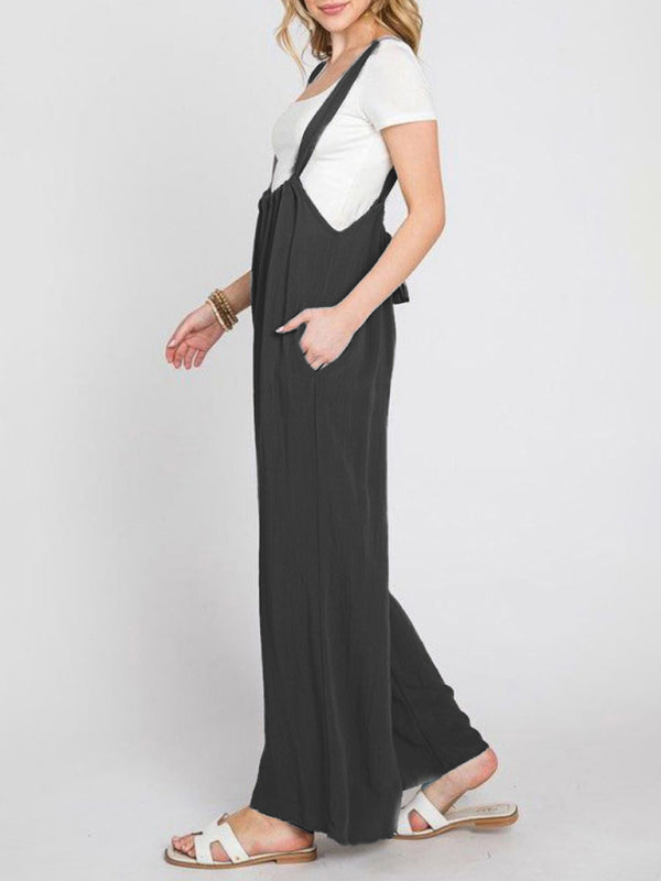 Side view of black wide-leg jumpsuit with lace-up
