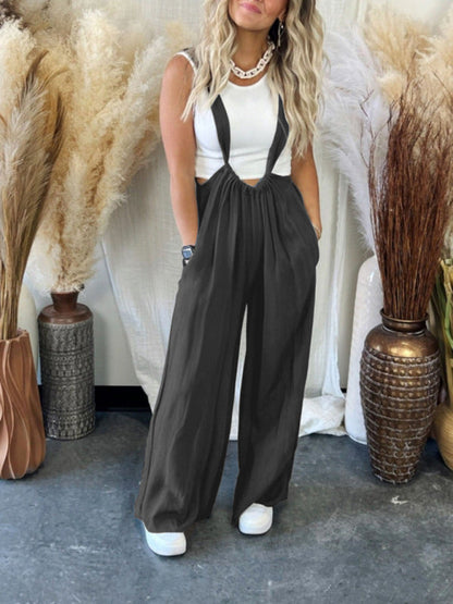 Black wide-leg jumpsuit with lace-up and pockets