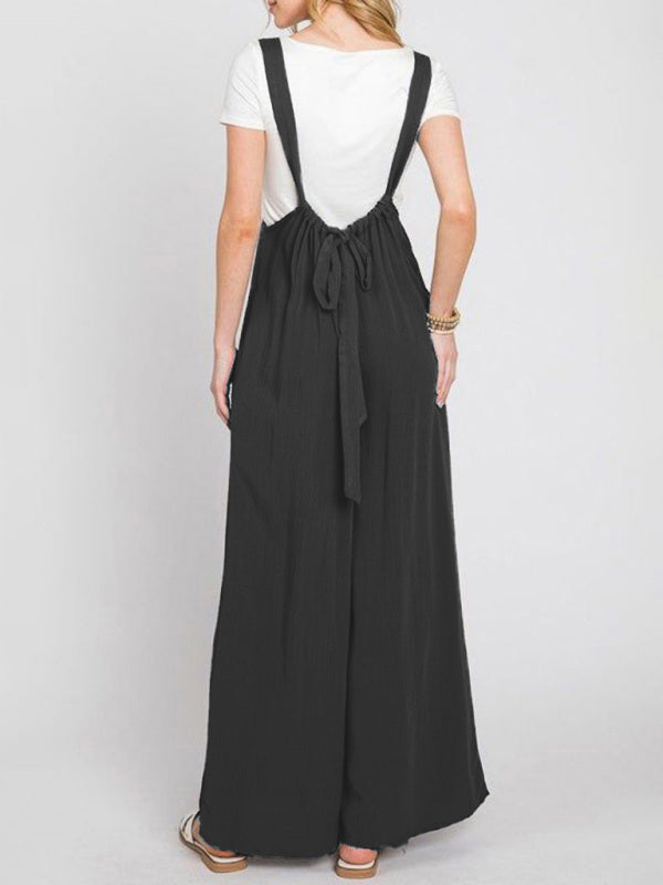 Back view of black jumpsuit with lace-up detail