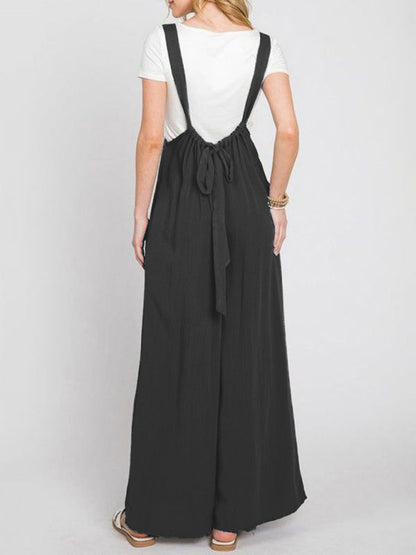 Back view of black jumpsuit with lace-up detail