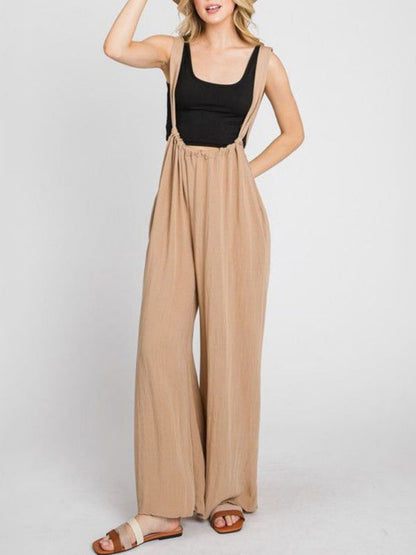 Beige wide-leg jumpsuit with lace-up and pockets
