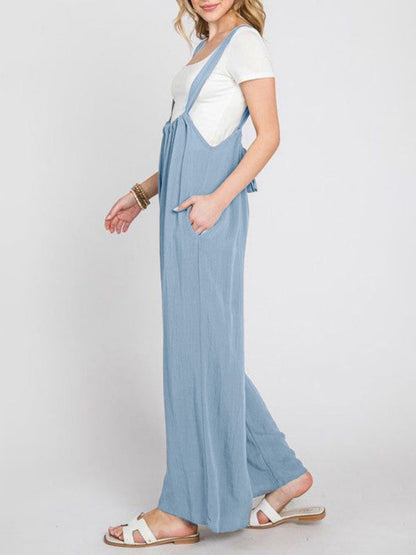 Blue wide-leg jumpsuit with lace-up and pockets