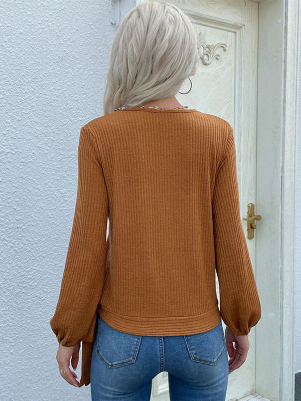 Lässiger, einfarbiger Strickpullover für Damen mit Knopfverschluss am Boden 