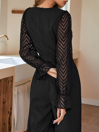 Back view of black jumpsuit with patterned sleeves