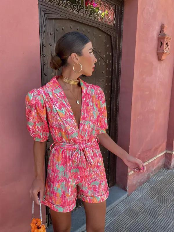 Stylish printed jumpsuit with tie waist and V-neck