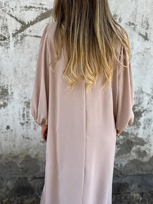 Beige V-neck lantern sleeve dress, back view