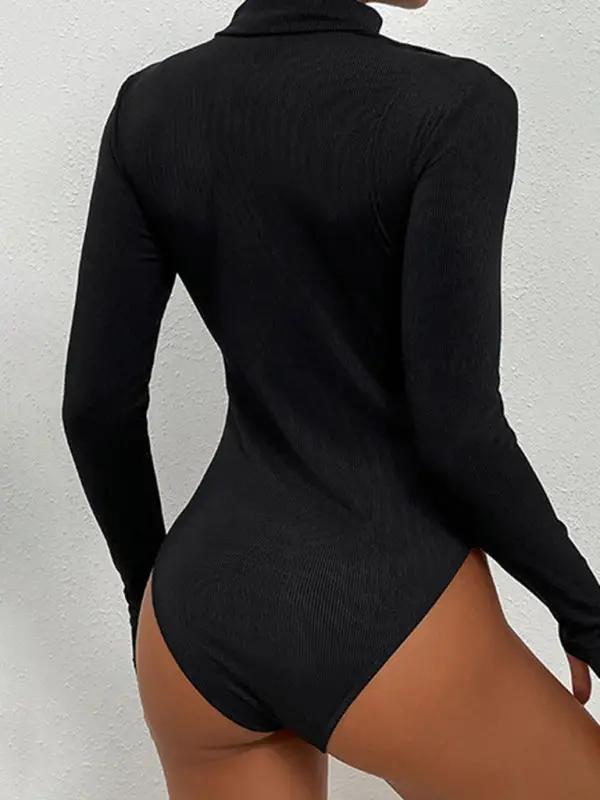 Back view of black onesie with long sleeves