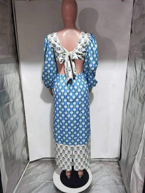 Rückenfreies Kleid mit floralem Kontrast und Laternenärmeln 