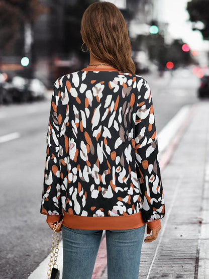 New round neck dropped shoulder lantern sleeve printed top