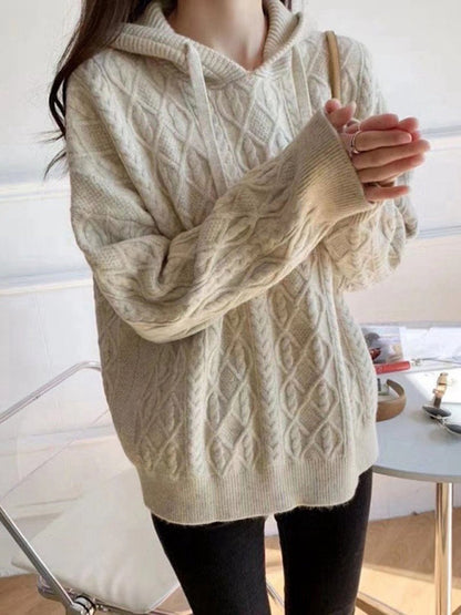 Pull tricoté ample à capuche torsadé pour femme 