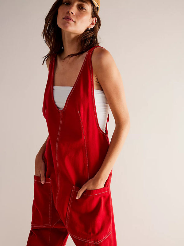 Red V-neck jumpsuit with front pockets