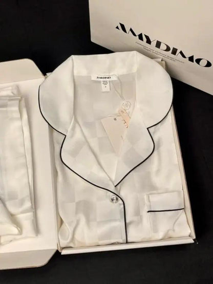 White ice silk pajamas with black piping