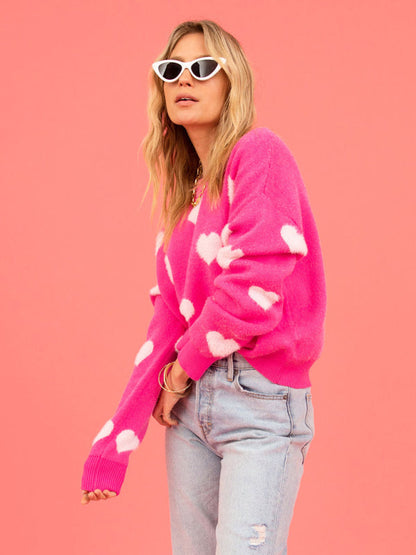 Stylish pink heart sweater with white sunglasses