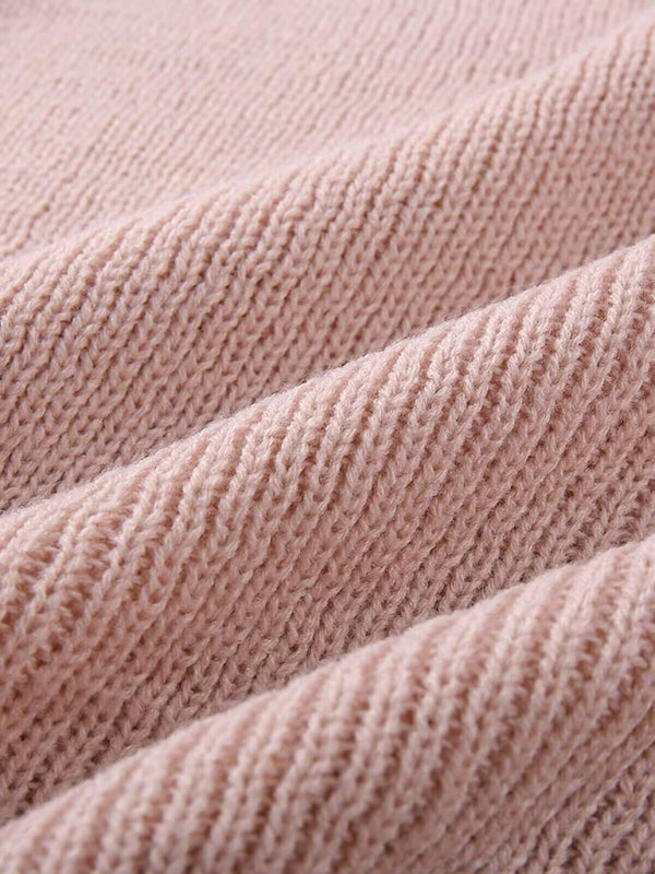 Close-up of pink sweater fabric texture