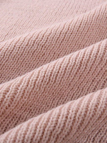 Close-up of pink sweater fabric texture