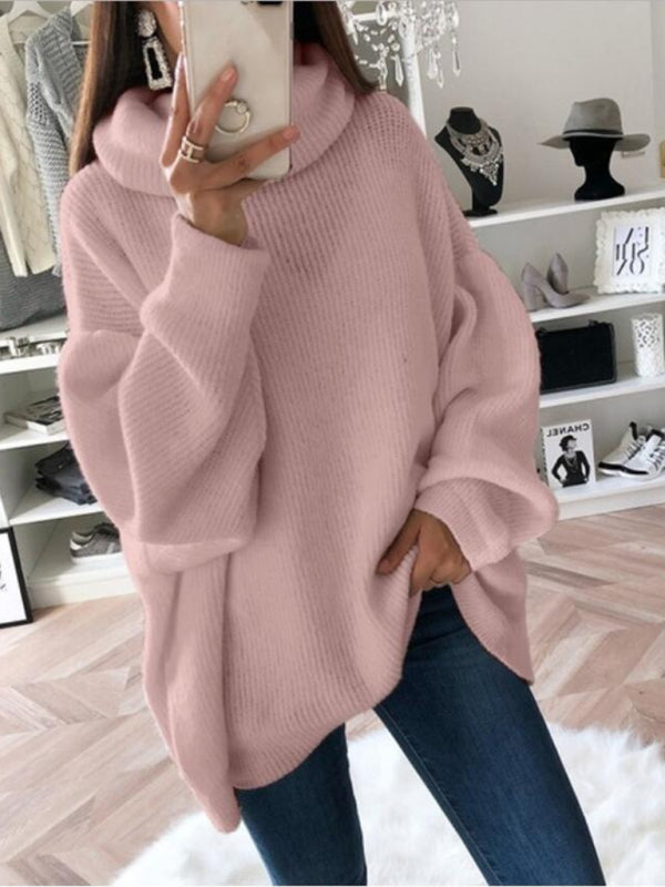 Pink loose turtleneck sweater on person