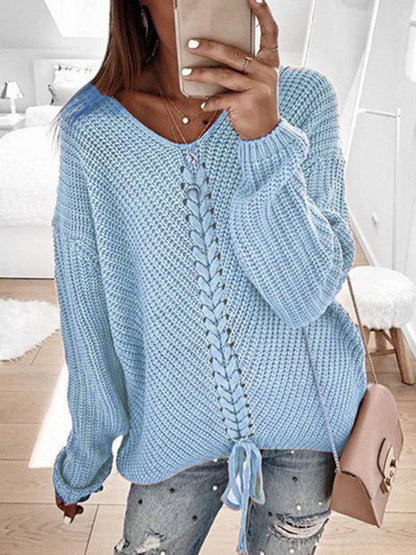 Light blue V-neck drawstring pullover sweater, styled with jeans