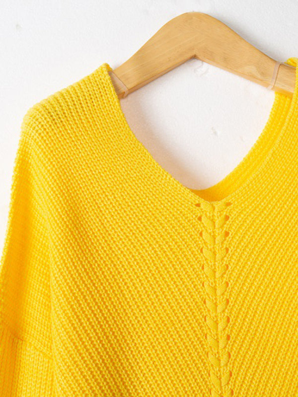 Yellow V-neck pullover sweater on hanger