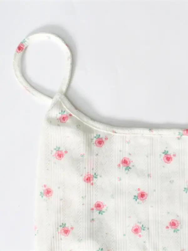 Close-up of floral print bodysuit strap
