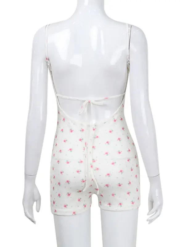 Back view of floral print bodysuit on mannequin