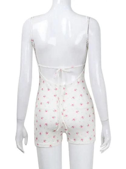 Back view of floral print bodysuit on mannequin