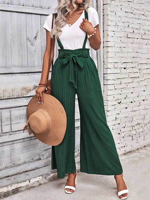 Green wide leg overalls with adjustable straps and bow tie