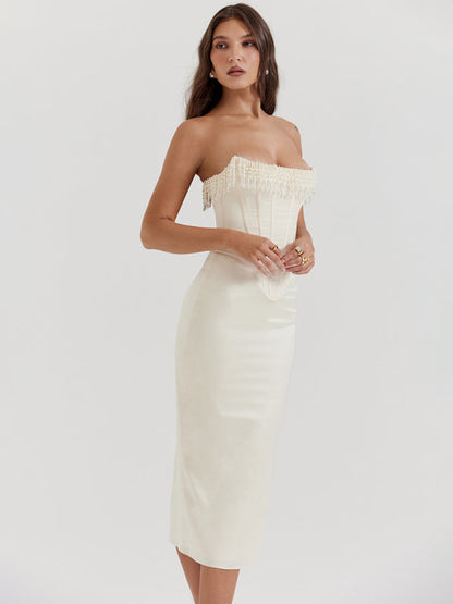 Side view of sexy sleeveless off-shoulder pearl dress