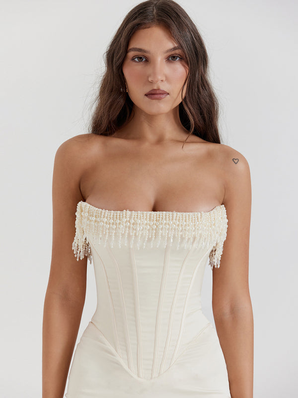 Front close-up of pearl fishbone off-shoulder dress