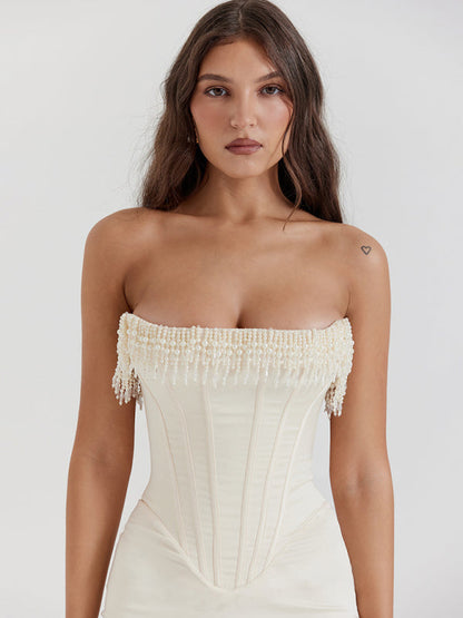 Front close-up of pearl fishbone off-shoulder dress