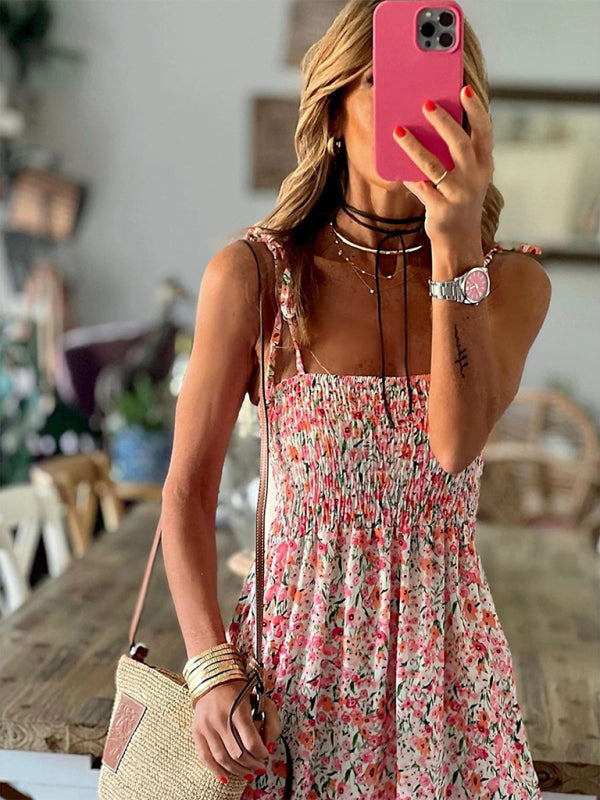 Close-up of floral suspender dress and accessories