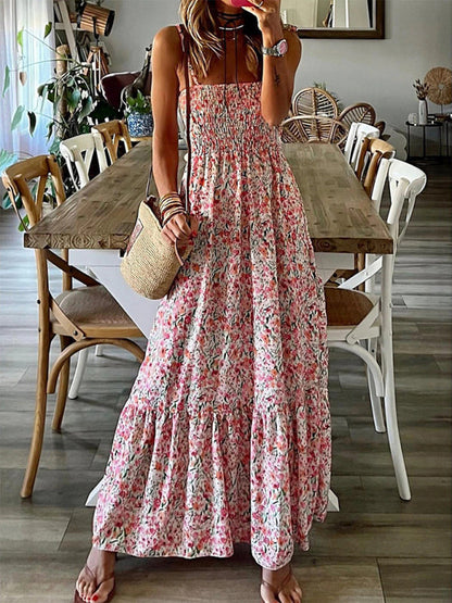 Full view of floral printed suspender dress