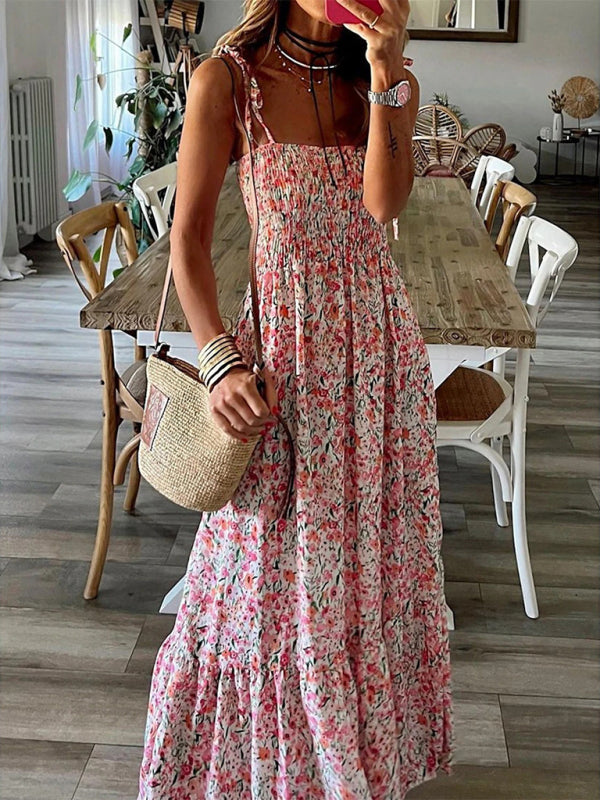 Floral printed suspender dress with straw bag