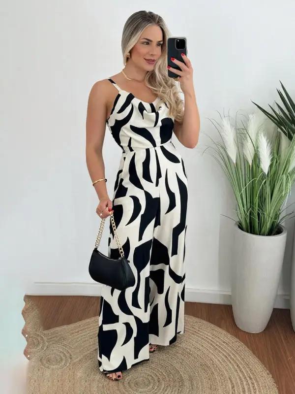 Black and white suspender jumpsuit with abstract pattern